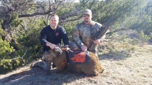 Trav and Nate with the toughest pig in Texas.